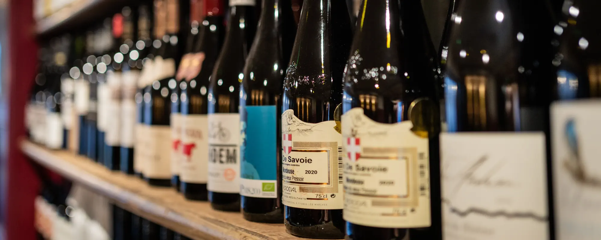 Image of a selection of wine bottles in Le Petit Raisin wine bar in Edinburgh